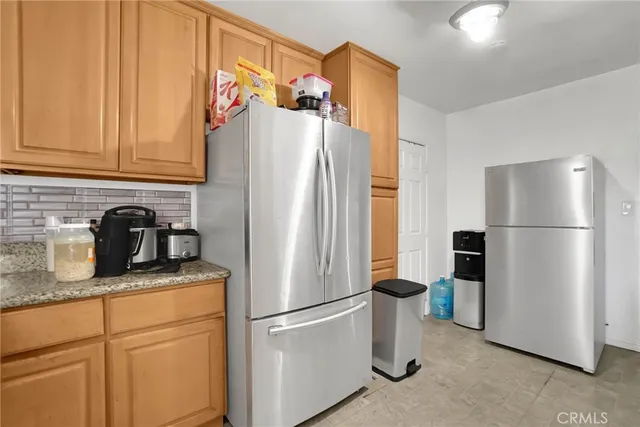 a bedroom with a bed and furniture