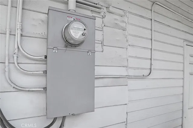 an aerial view of a house with outdoor space