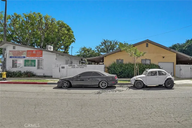 a car parked in front of a house