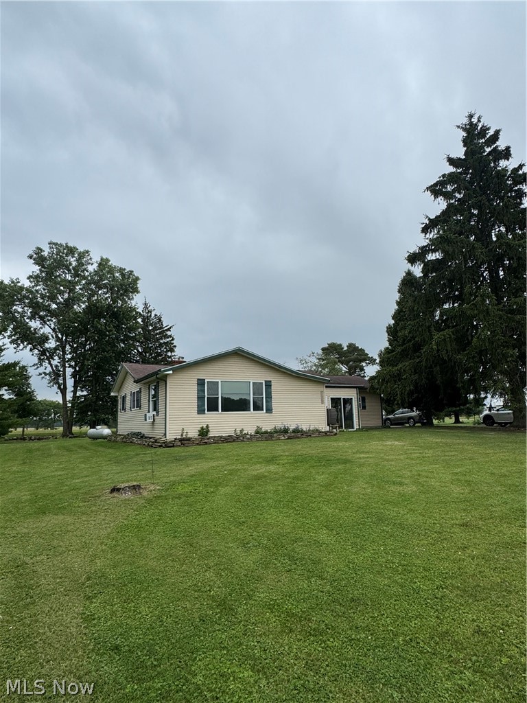vinyl sided ranch on nearly an acre