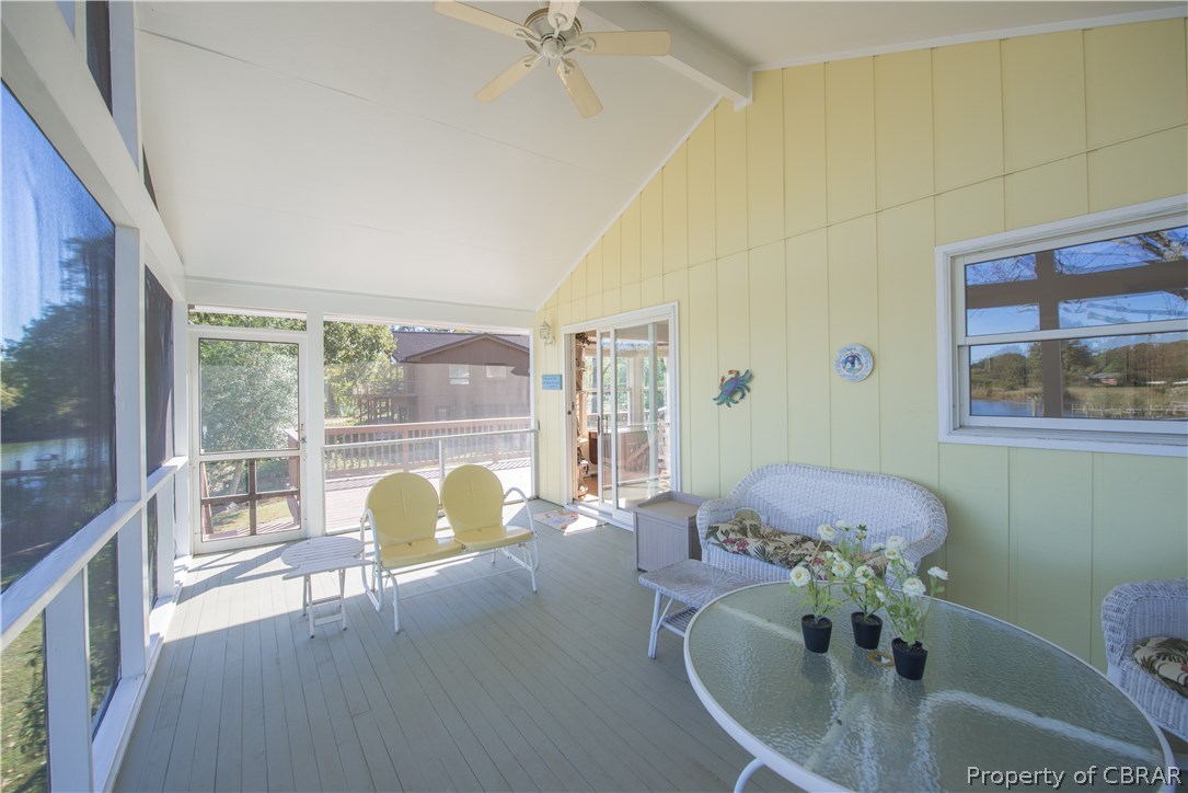 293 Prentice Point Drive Kilmarnock, VA 22482 - Photo 12 of 41 Spacious Screened Porch with Sliding Door to Dining Area