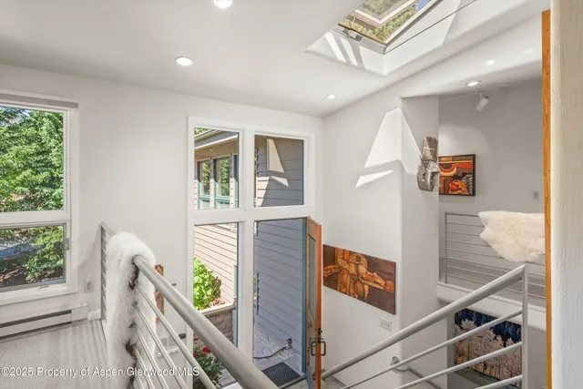 a room with furniture and a book shelf