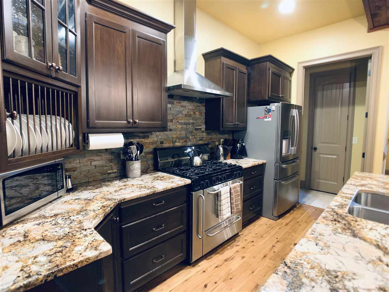 9624 Fayetteville Road Raleigh, NC 27603 - Photo 11 of 28 Exquisite Gourmet Kitchen w/high end granite tops and details Kitchen