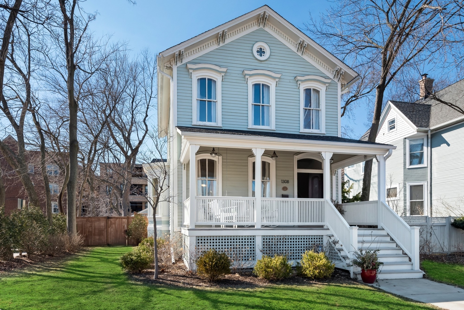 Undisclosed Address Evanston, IL 60201 - Photo 1 of 27 a front view of a house with a yard