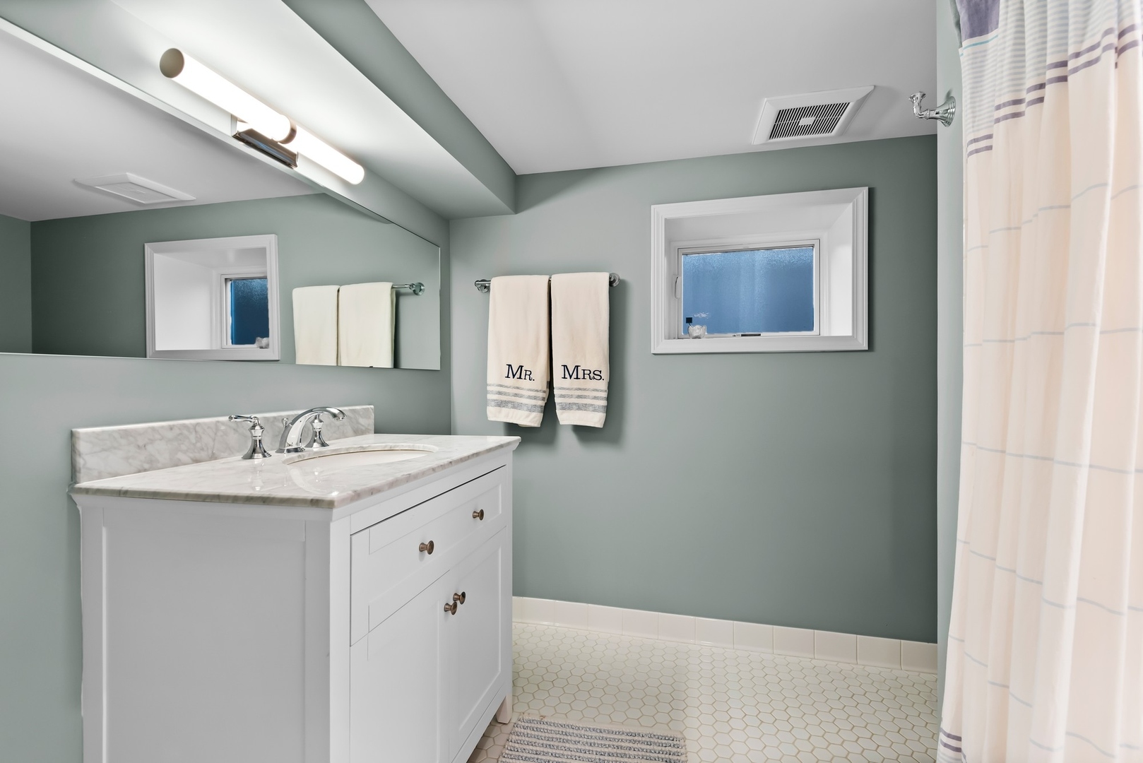Undisclosed Address Evanston, IL 60201 - Photo 19 of 27 a bathroom with a granite countertop sink a toilet and mirror