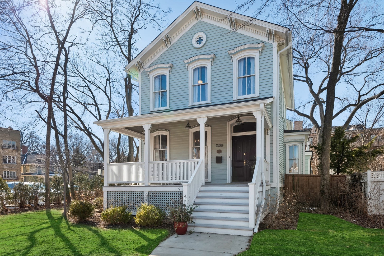 Undisclosed Address Evanston, IL 60201 - Photo 2 of 27 a front view of a house with a yard