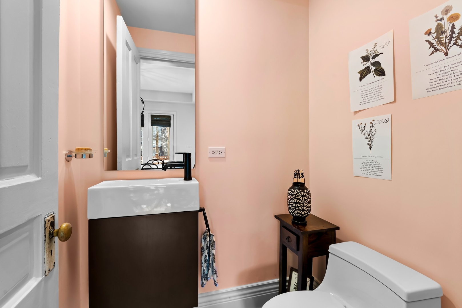 Undisclosed Address Evanston, IL 60201 - Photo 21 of 27 a bathroom with a sink and a mirror