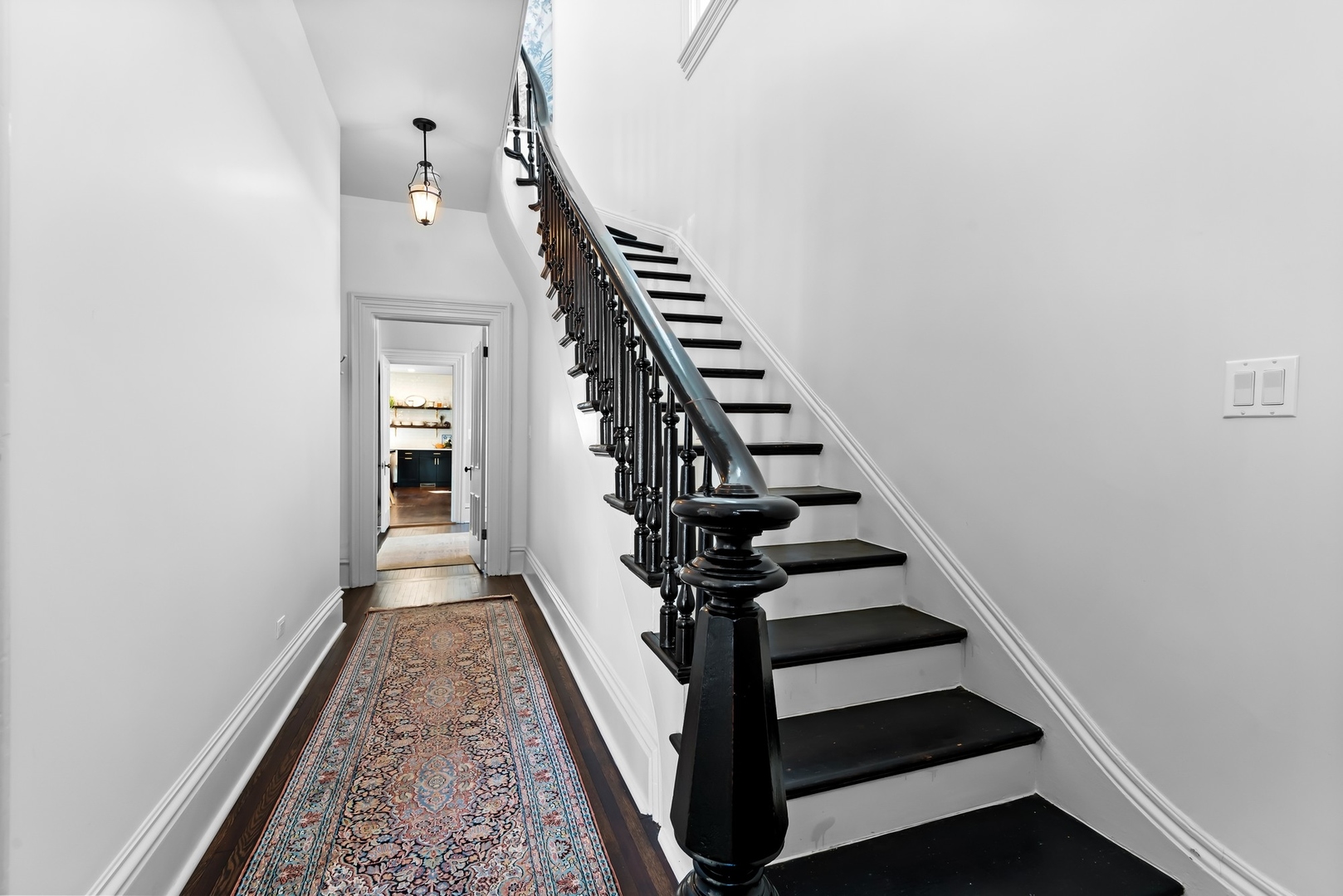 Undisclosed Address Evanston, IL 60201 - Photo 4 of 27 a view of entryway and hall with wooden floor