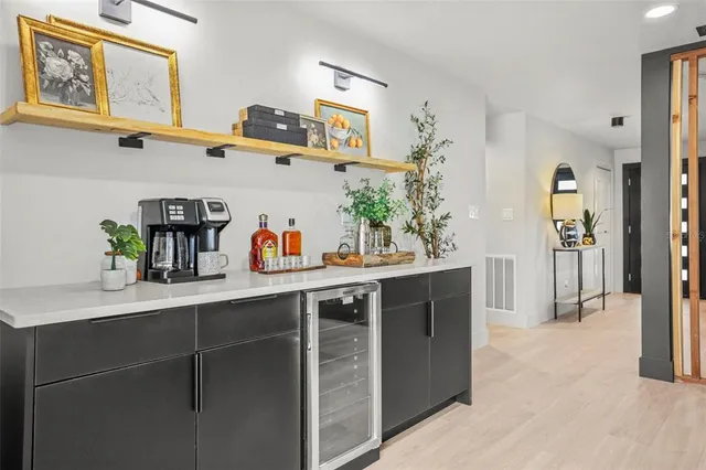 a bathroom with a toilet a sink and shower