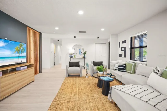 a bathroom with a toilet a sink and shower