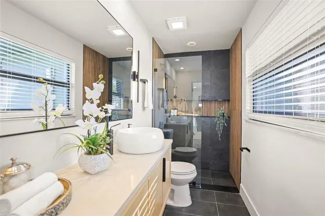 a view of a city with mountains in the background