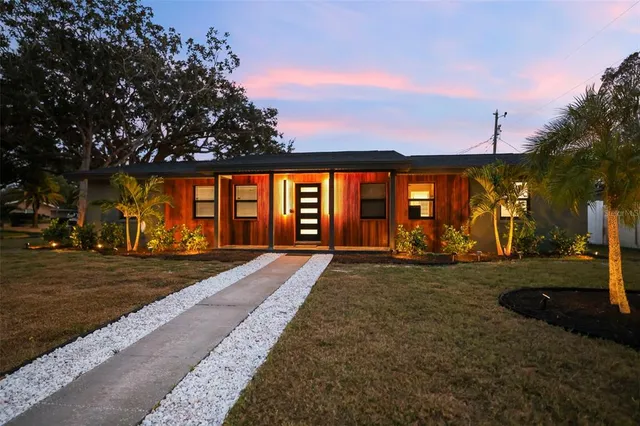 an aerial view of residential building with parking space