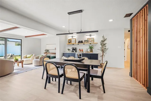a kitchen with a sink cabinets and window