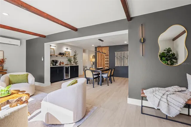 a living room with furniture and a table