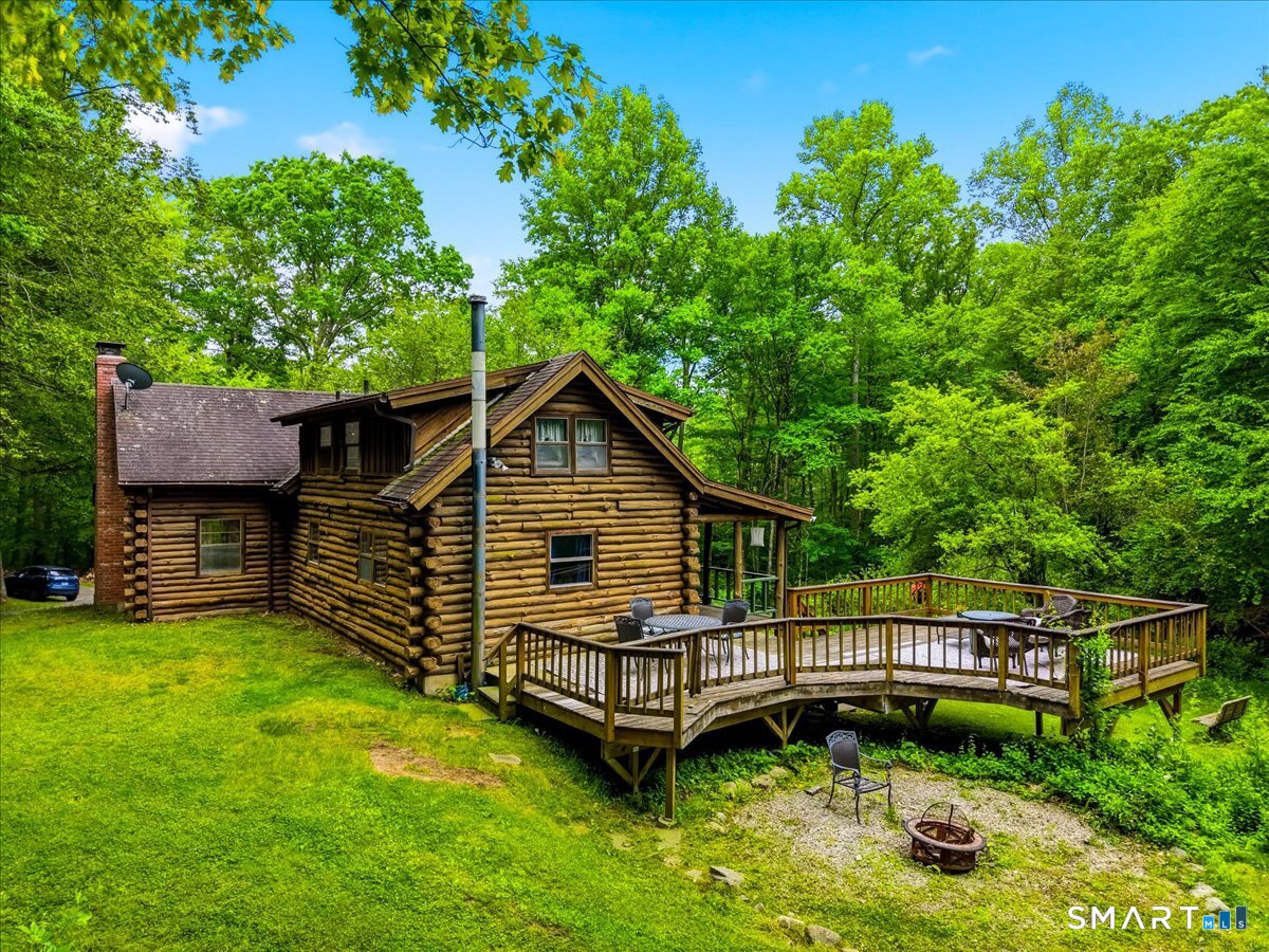 115 Green Hill Road Killingworth, CT 06419 - Photo 5 of 40 Enjoy views off the deck or sit around the fire pit