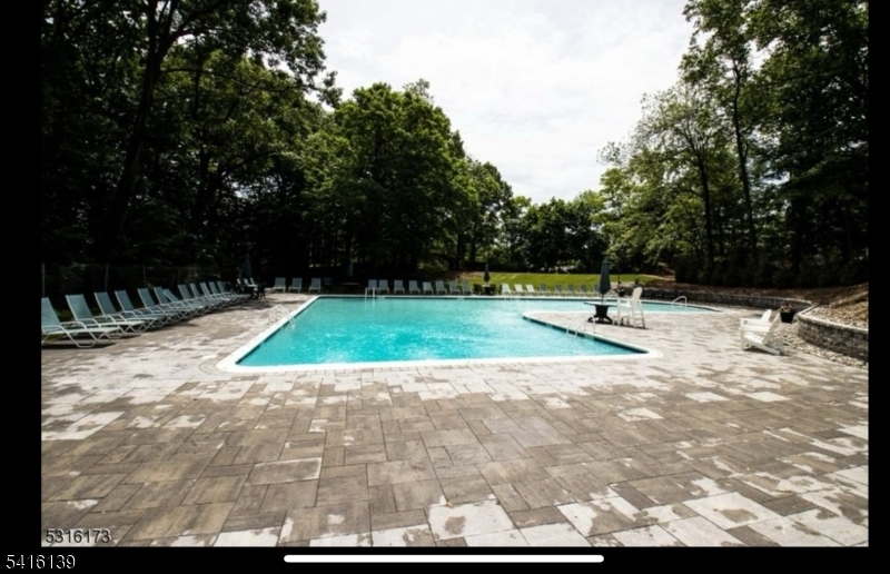 10 Troy Drive, Unit 10A Springfield, NJ 07081 - Photo 21 of 23 a view of a park with swings