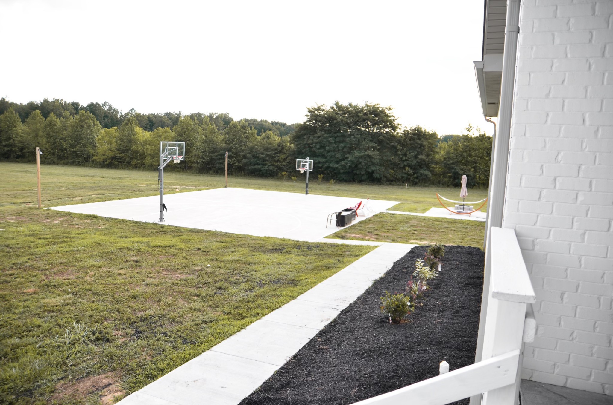 5931 Lakeview Road Springfield, TN 37172 - Photo 53 of 55 a view of a tennis court with a small yard