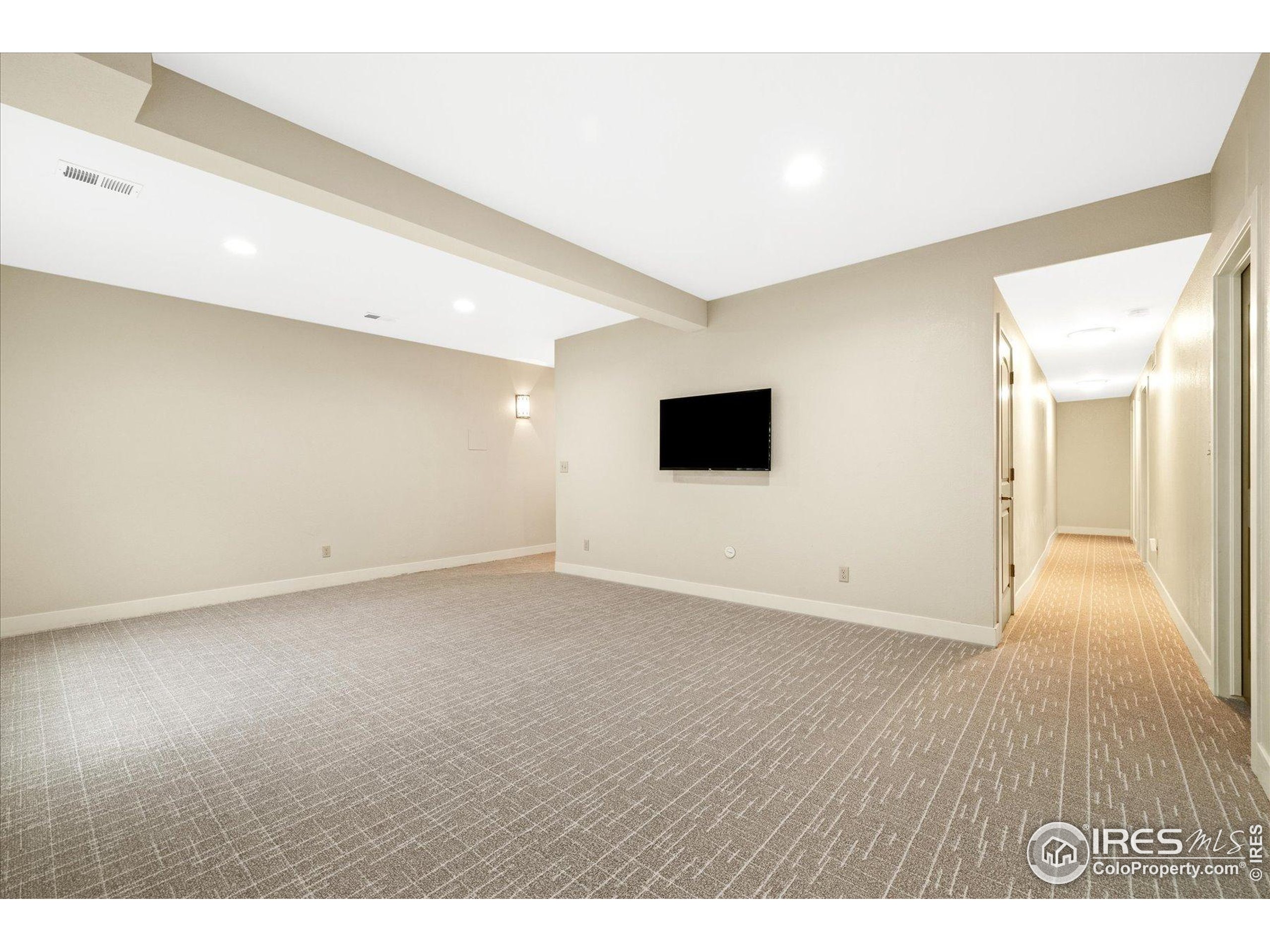 403 Double Tree Drive Greeley, CO 80634 - Photo 29 of 49 a view of an empty room with wooden floor