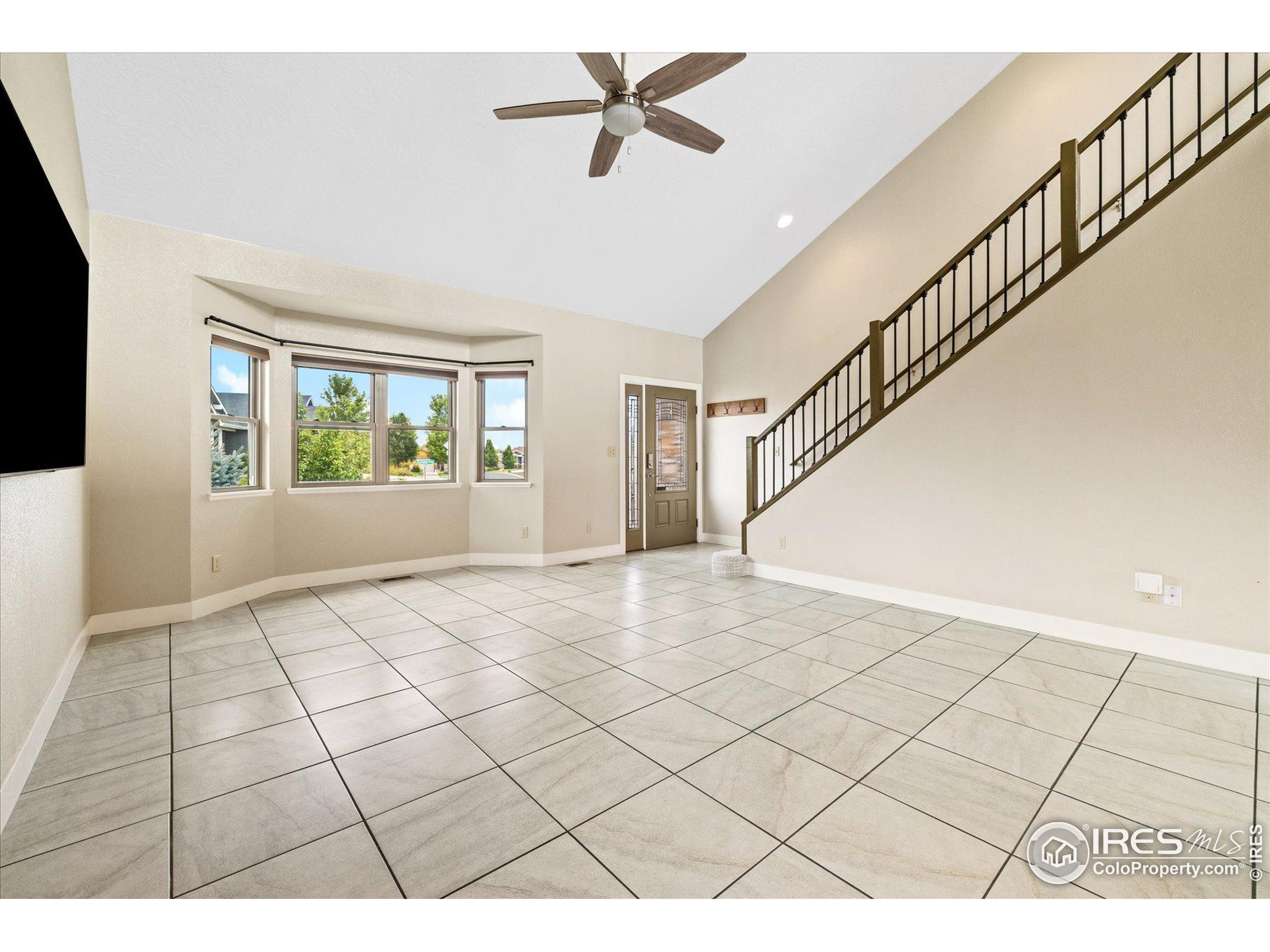 403 Double Tree Drive Greeley, CO 80634 - Photo 3 of 49 a view interior of a house and wooden floor windows