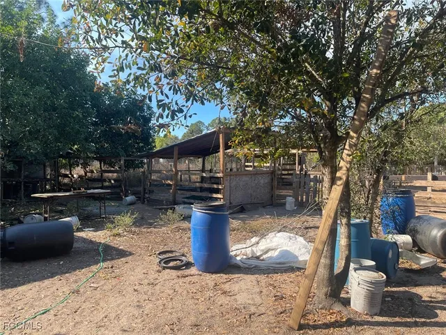 a view of a barn in the backyard
