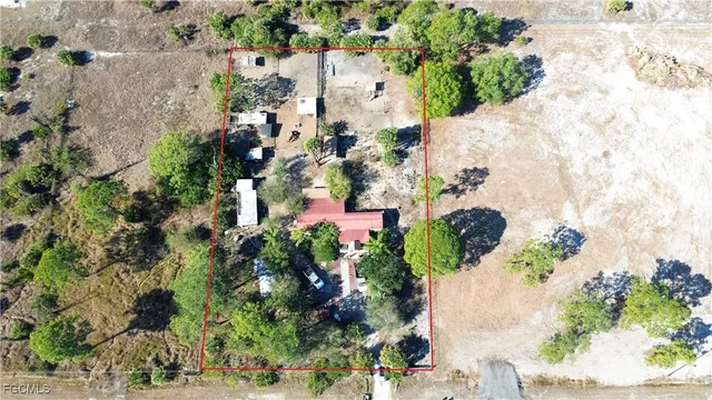 a sign broad on the side of the road