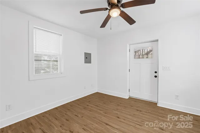 a kitchen with a sink cabinets and window