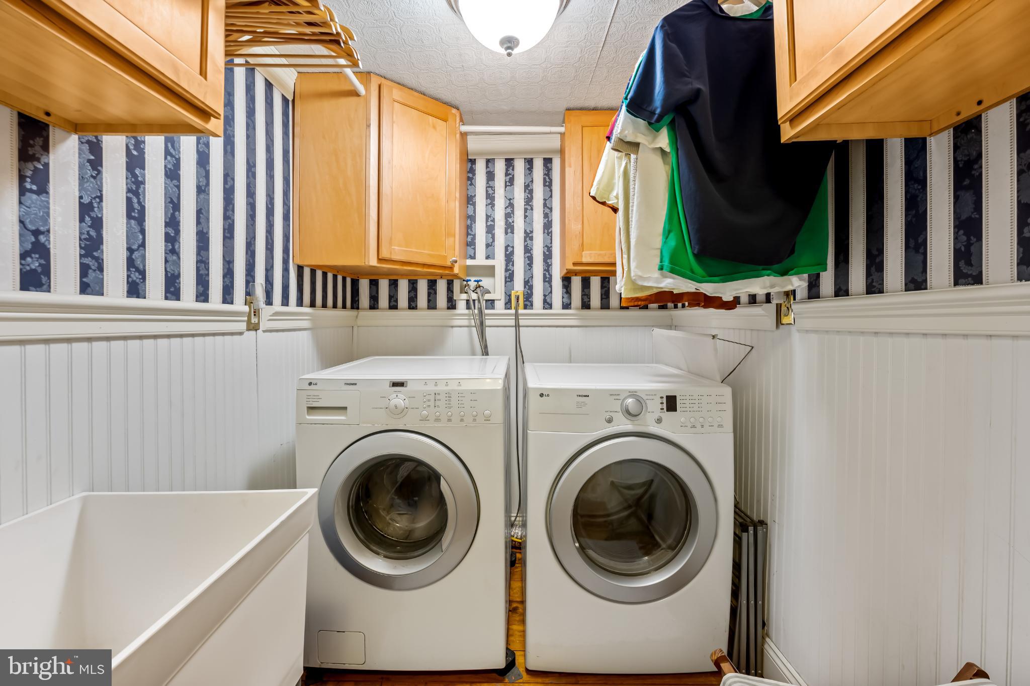 35 South Calhoun Street Baltimore, MD 21223 - Photo 26 of 29 Charming laundry nook with modern appliances.