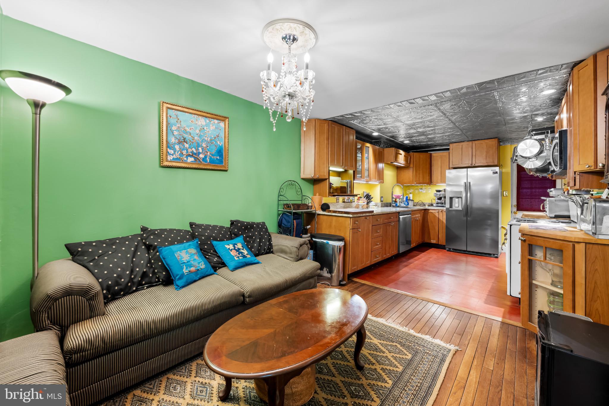 35 South Calhoun Street Baltimore, MD 21223 - Photo 8 of 29 Charming kitchen with vibrant green accents.