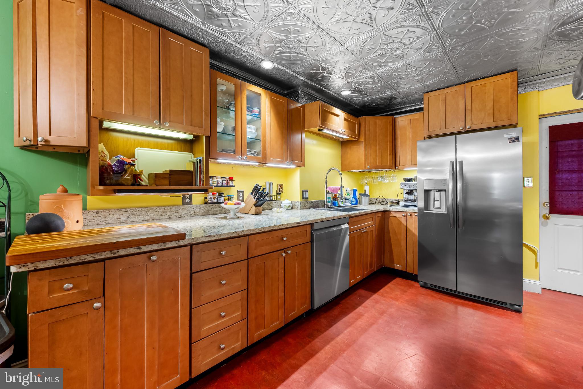 35 South Calhoun Street Baltimore, MD 21223 - Photo 10 of 29 Vibrant kitchen with modern charm.