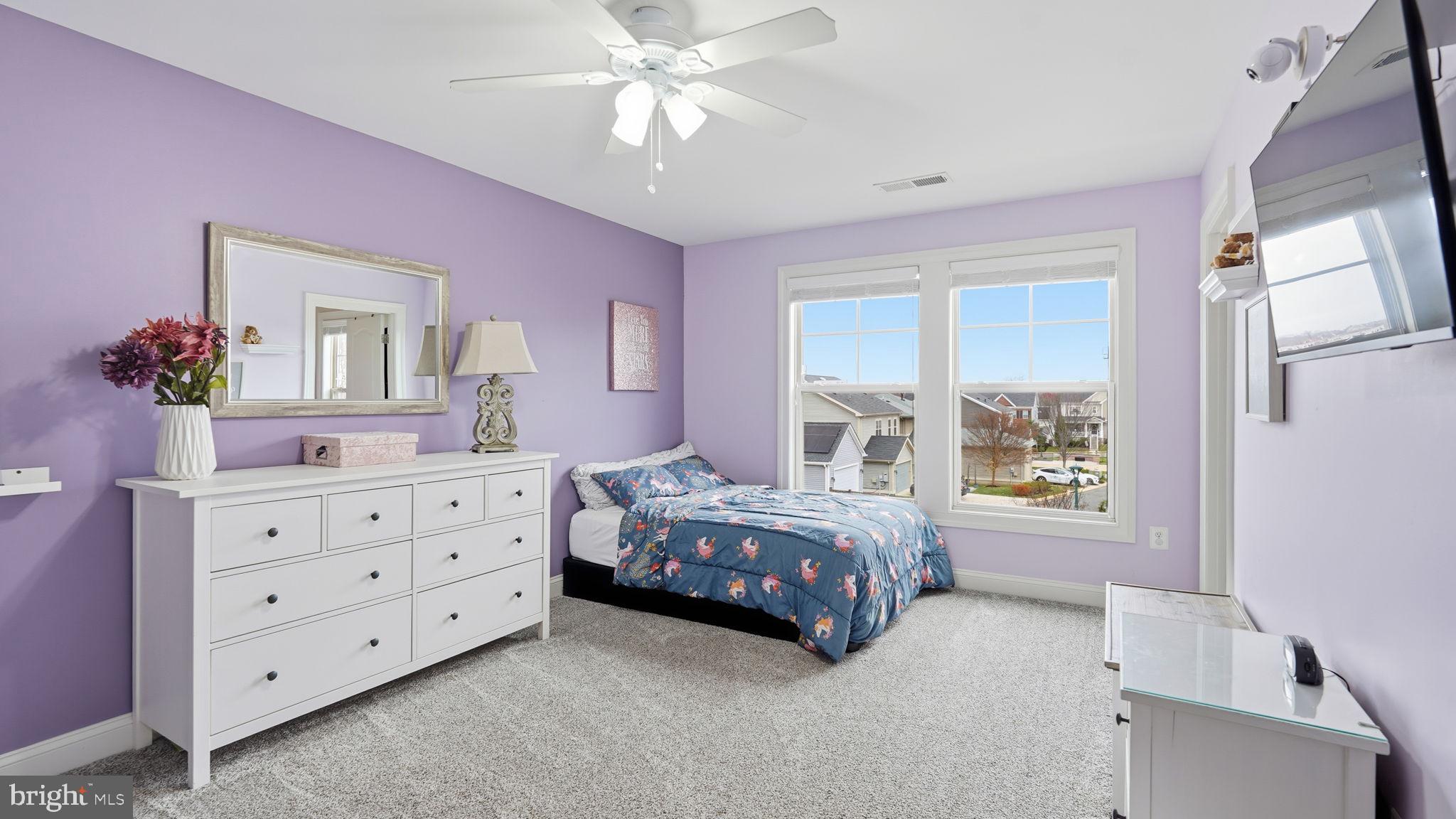 111 Pear Blossom Road Stafford, VA 22554 - Photo 27 of 68 a bedroom with a bed and a dresser