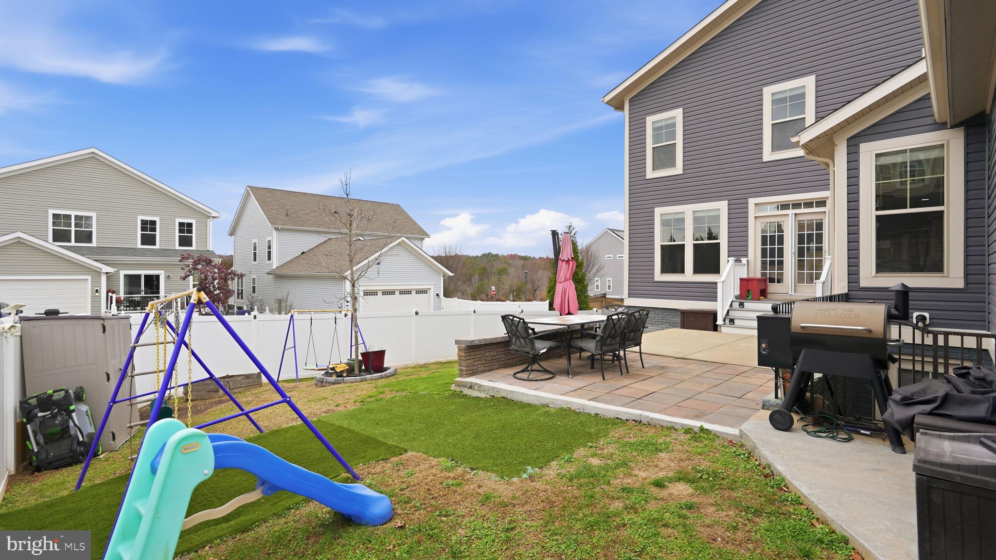 111 Pear Blossom Road Stafford, VA 22554 - Photo 37 of 68 a view of a house with patio