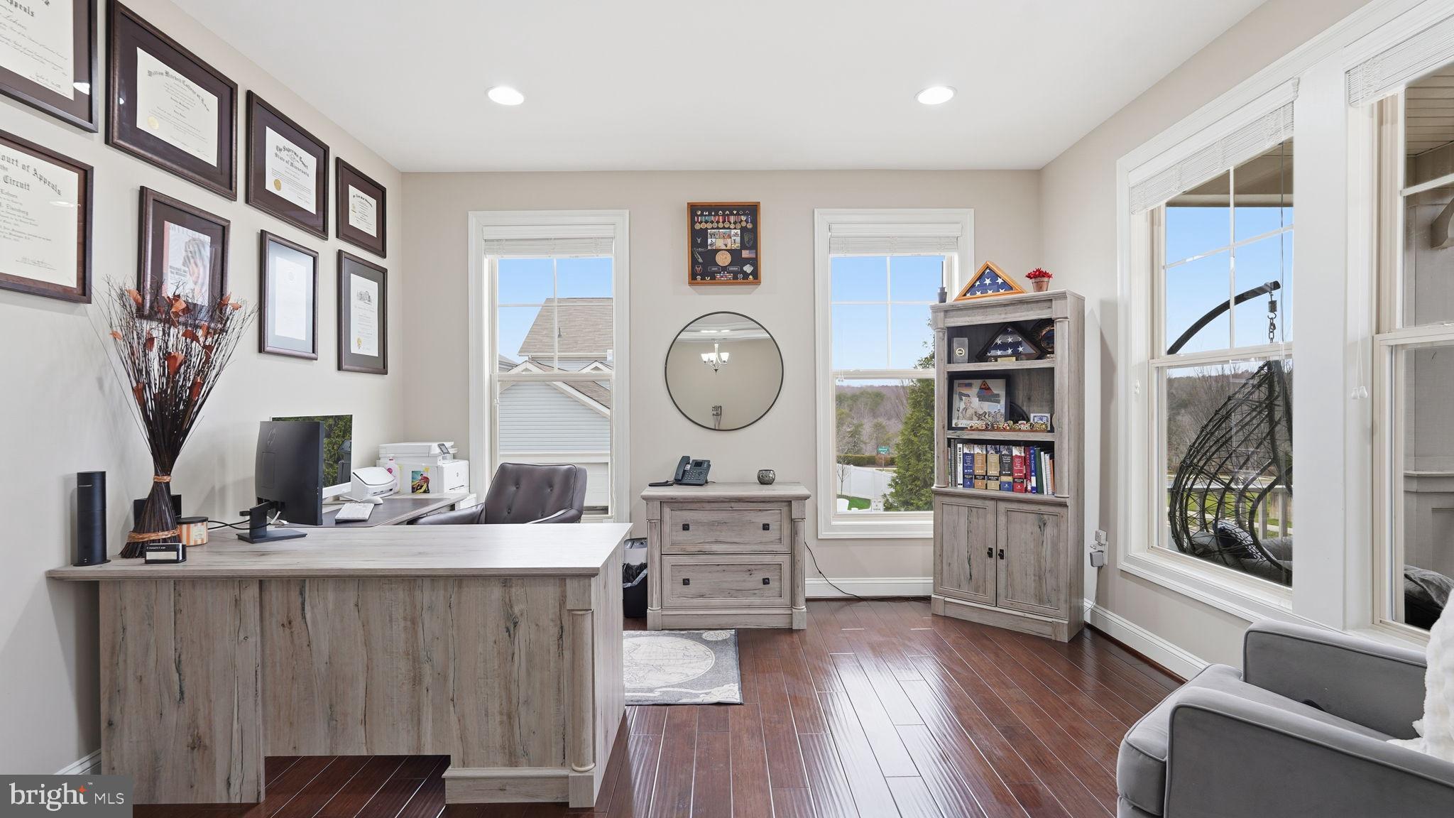 111 Pear Blossom Road Stafford, VA 22554 - Photo 5 of 68 a living room with furniture and a wooden floor