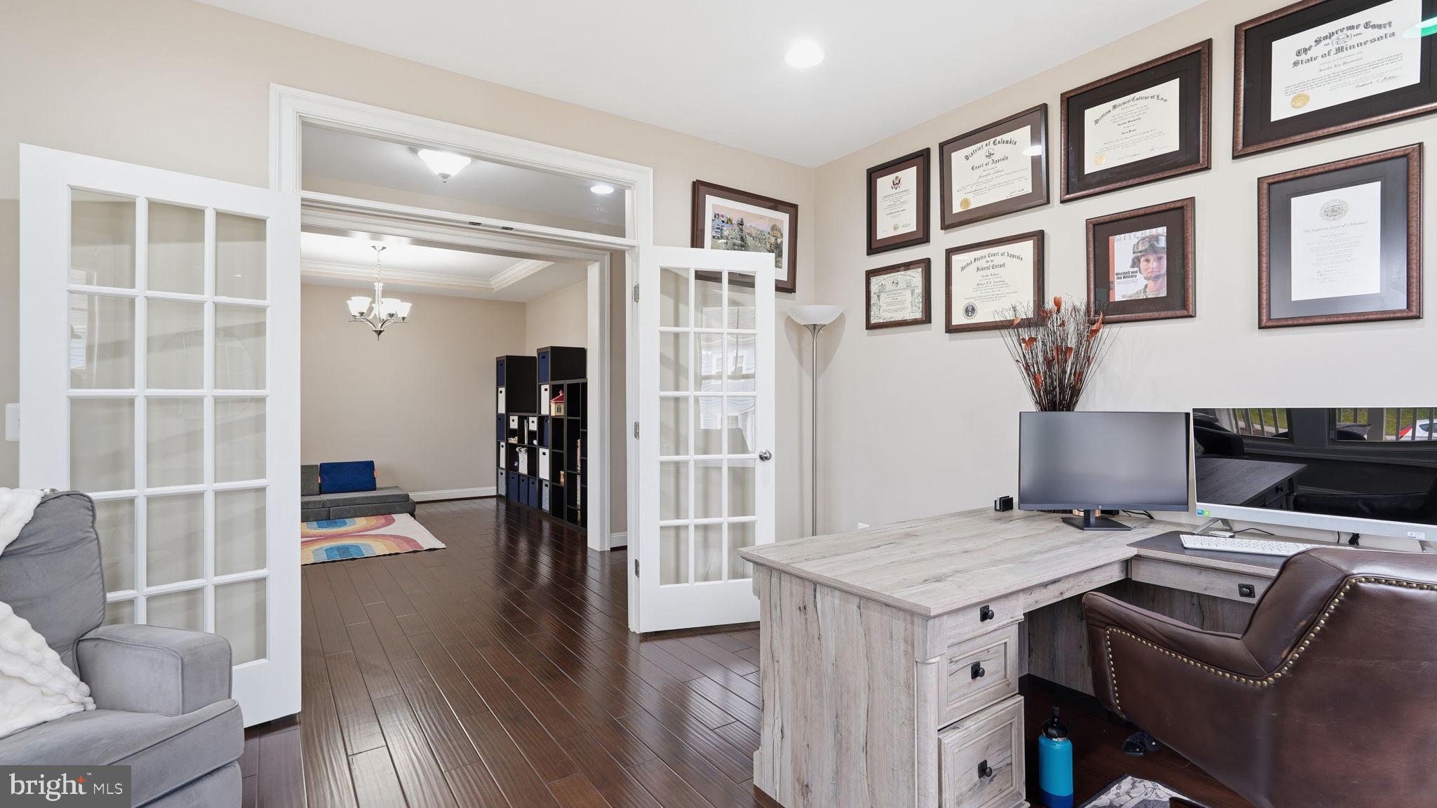 111 Pear Blossom Road Stafford, VA 22554 - Photo 6 of 68 a view of kitchen and dining room with wooden floor