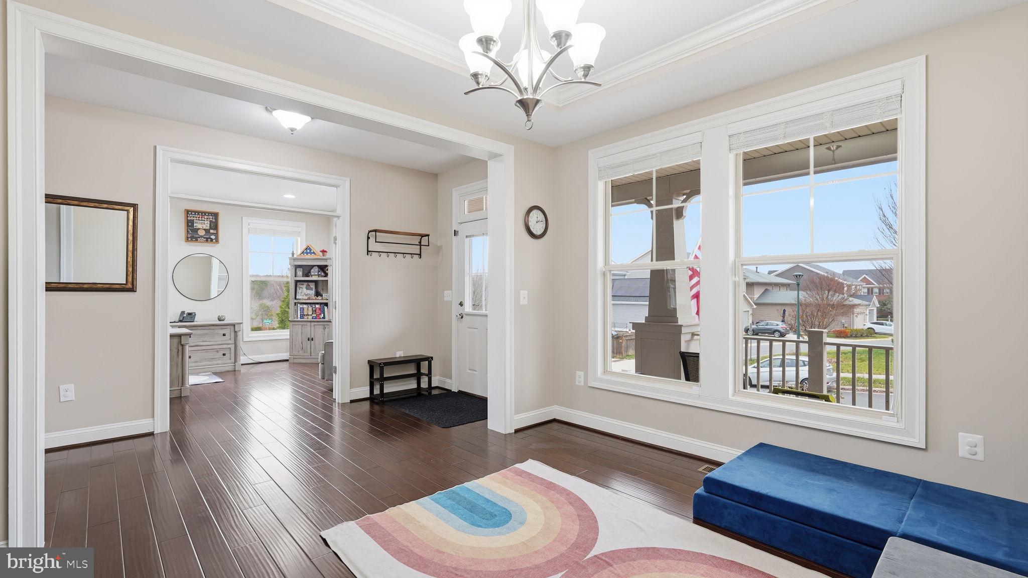 111 Pear Blossom Road Stafford, VA 22554 - Photo 7 of 68 a living room with furniture and a wooden floor