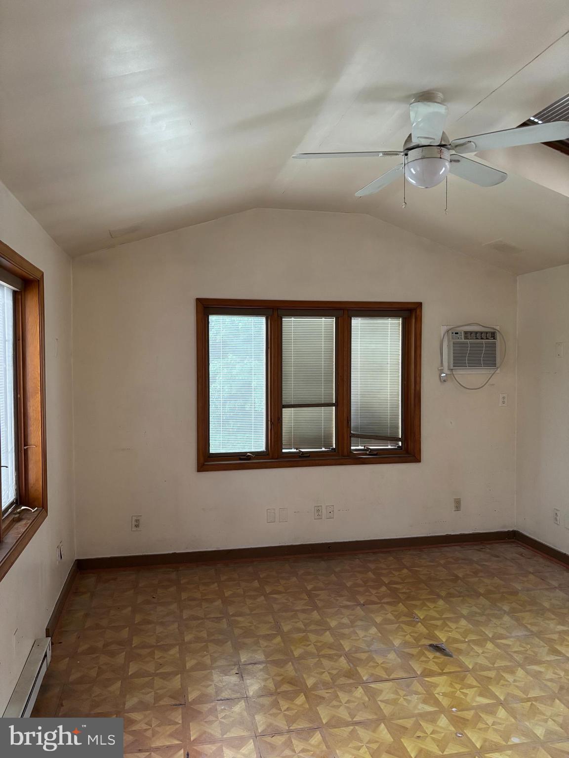 18 Southridge Road Darby, PA 19023 - Photo 6 of 13 a view of an empty room with a window