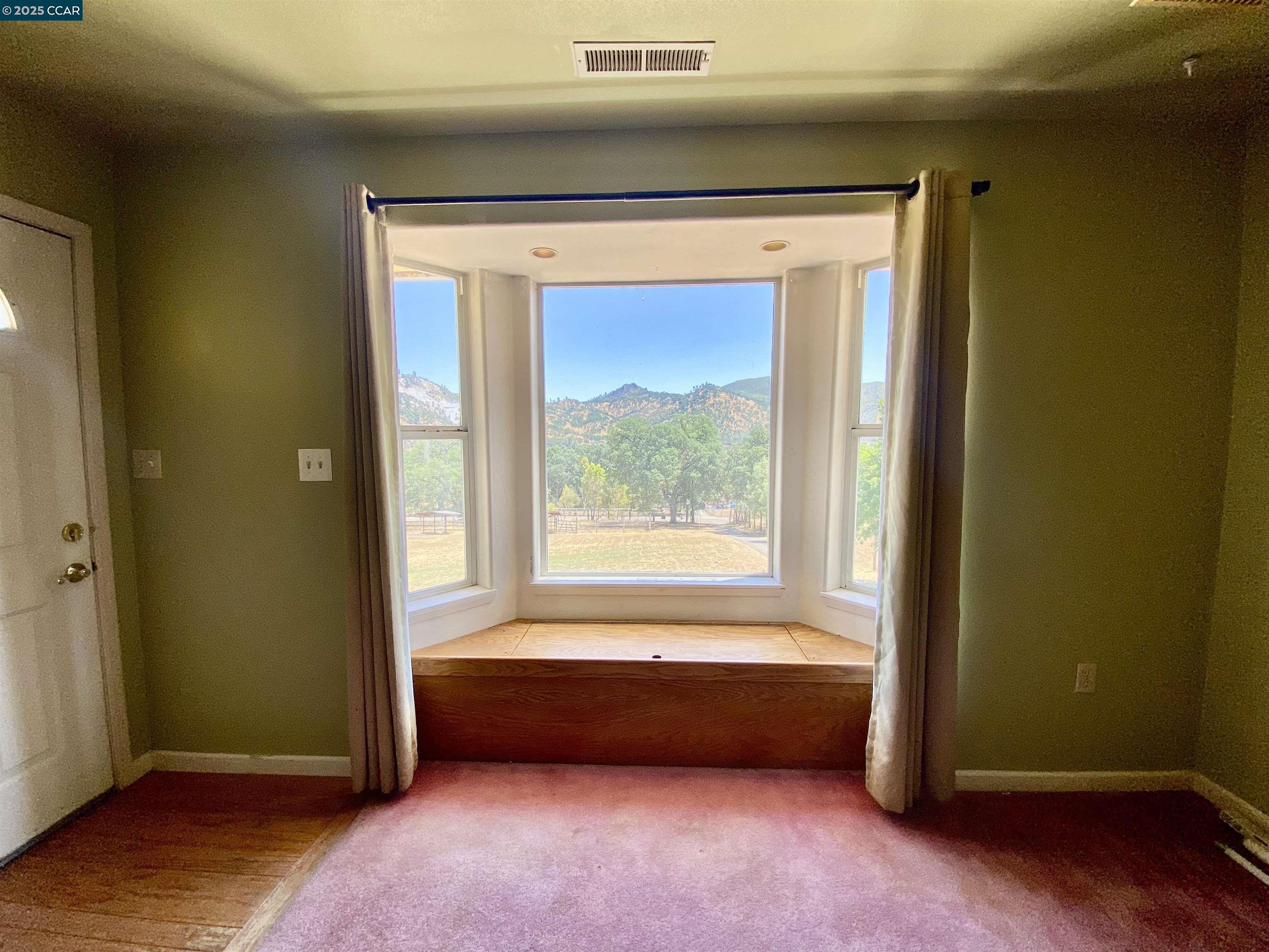 2707 River View Road Clearlake Oaks, CA 95423 - Photo 5 of 18 a view of room with window and a wardrobe