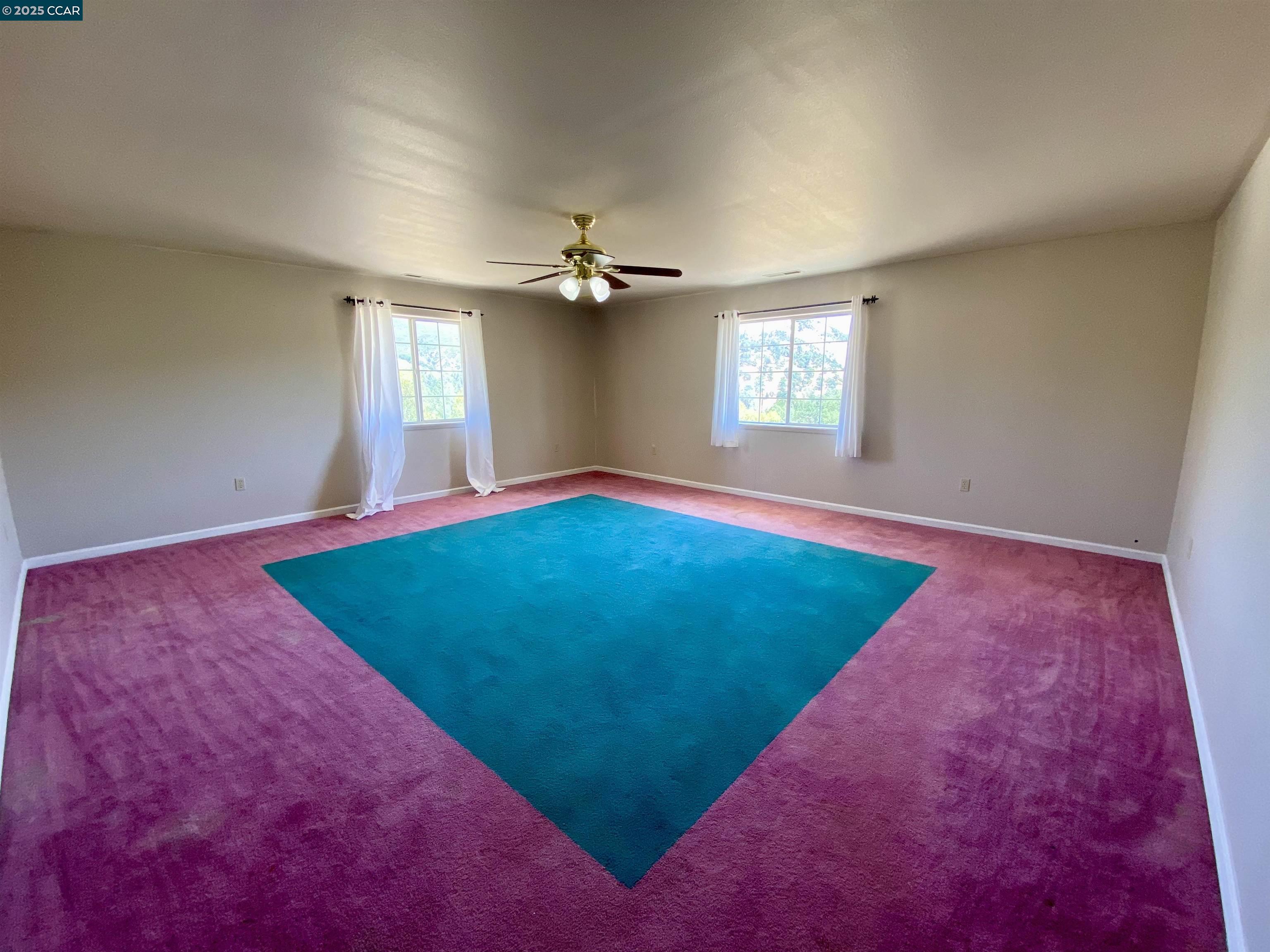 2707 River View Road Clearlake Oaks, CA 95423 - Photo 8 of 18 a view of an empty room with a window