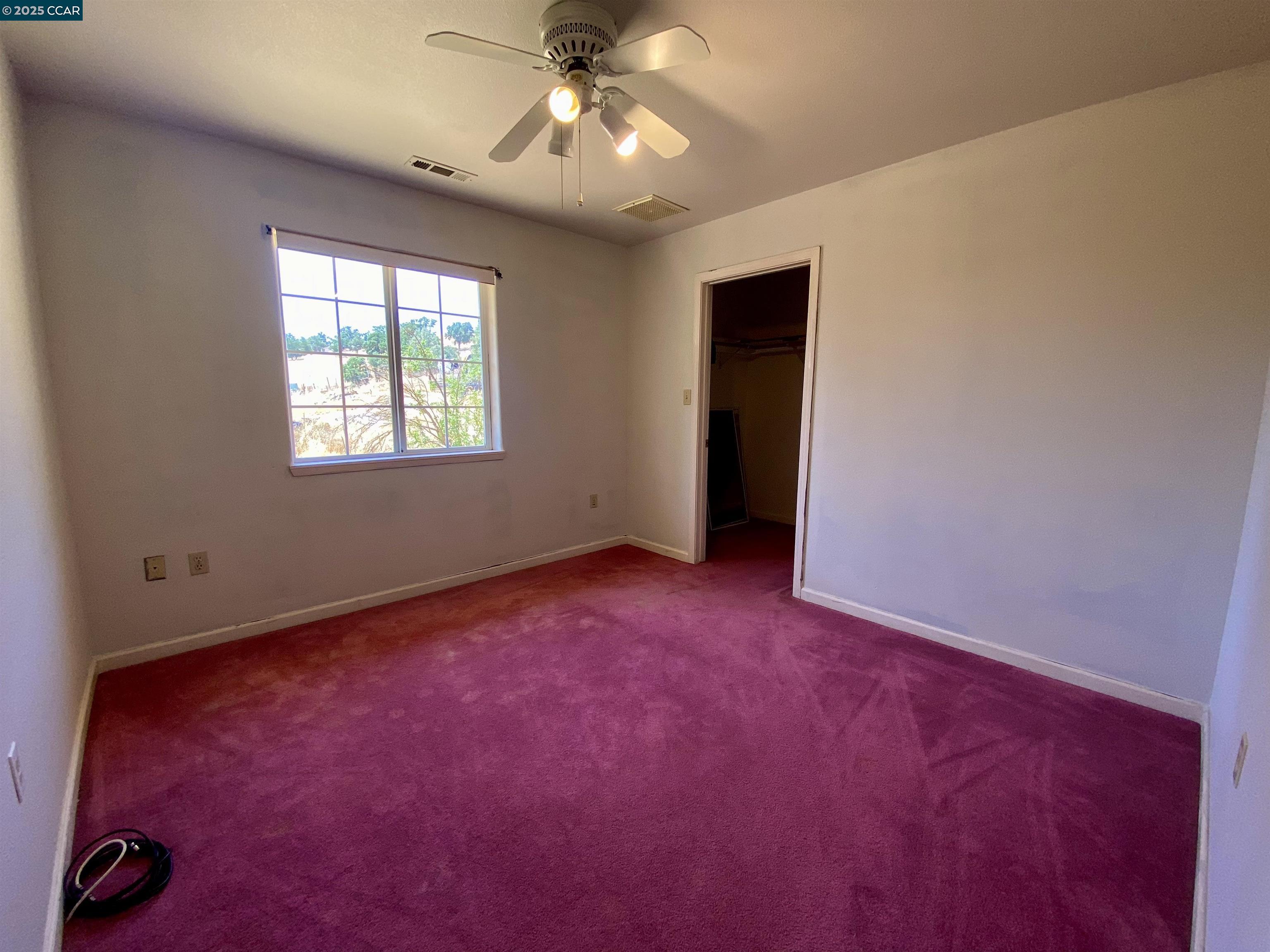 2707 River View Road Clearlake Oaks, CA 95423 - Photo 9 of 18 an empty room with windows and closet