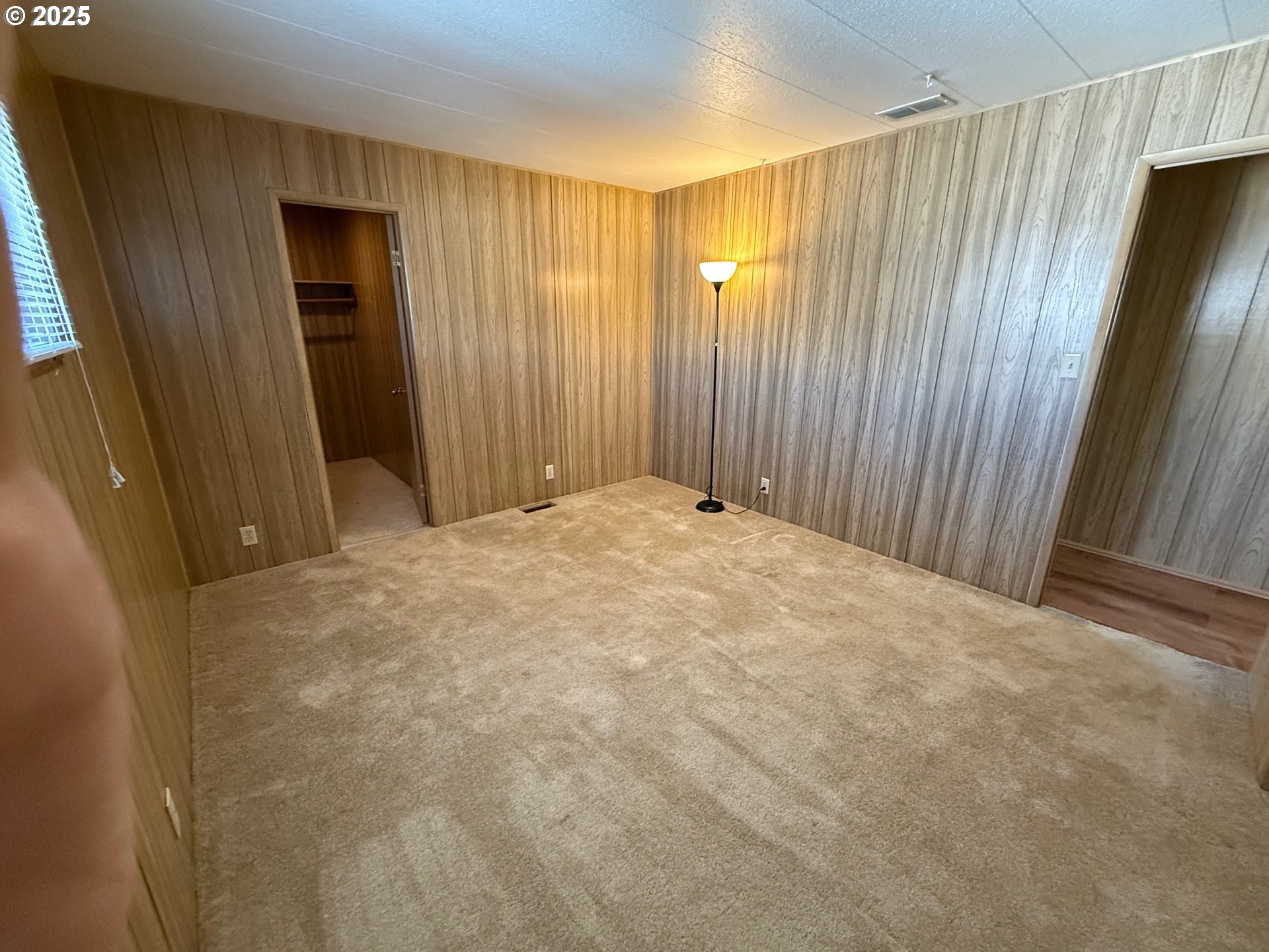5422 Portland Road Northeast, Unit 47 Salem, OR 97305 - Photo 28 of 45 a view of an empty room with wooden door