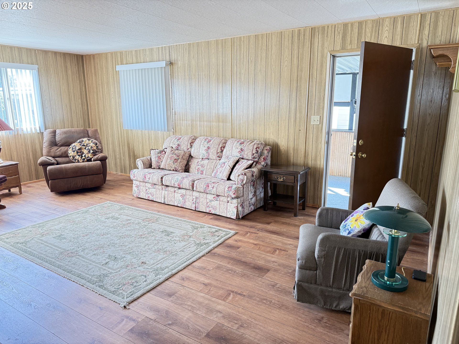 5422 Portland Road Northeast, Unit 47 Salem, OR 97305 - Photo 6 of 45 a living room with furniture rug and a window