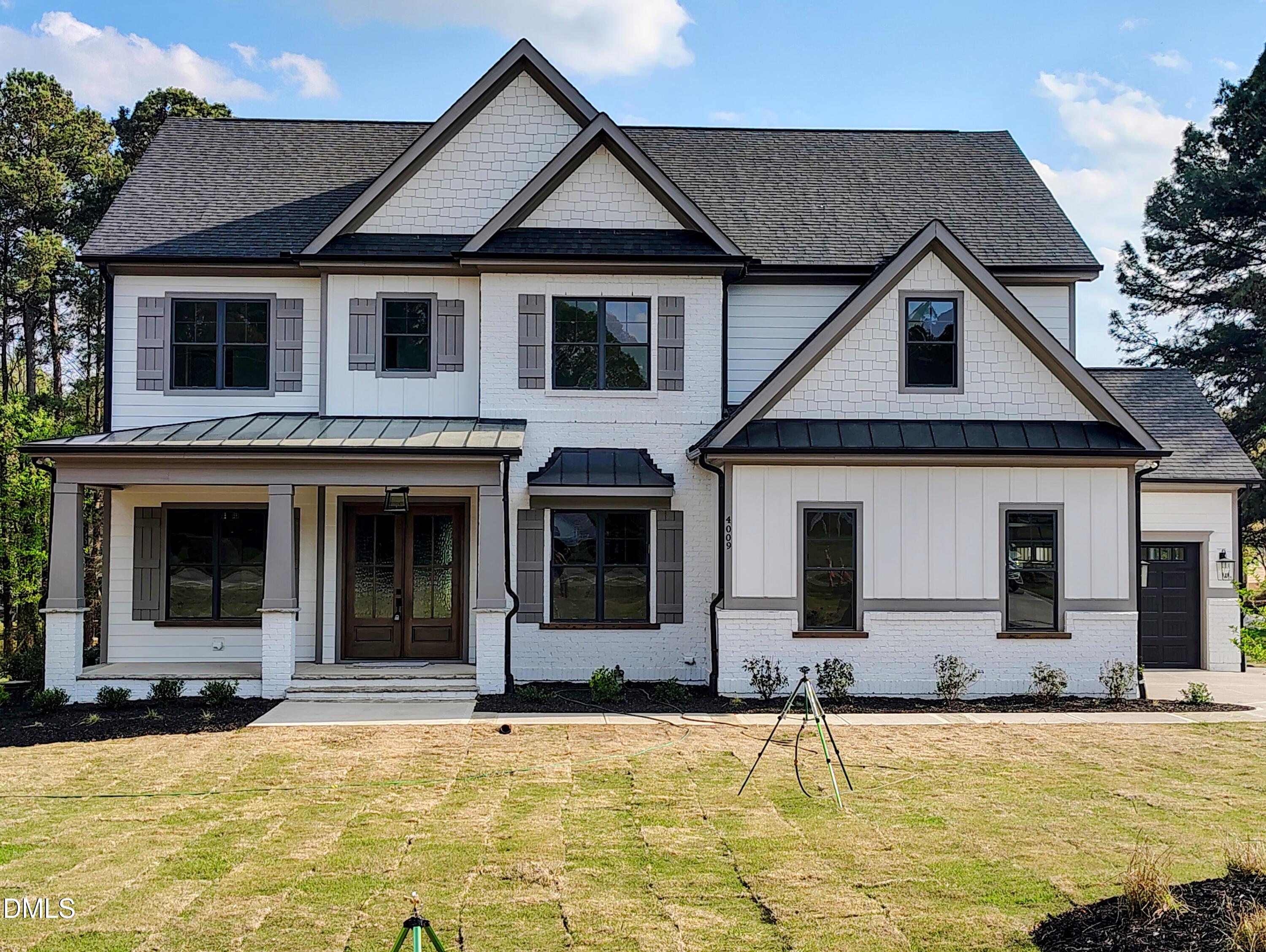 4009 Yates Mill Pond Road Raleigh, NC 27606 - Photo 1 of 52 a house view with a outdoor space