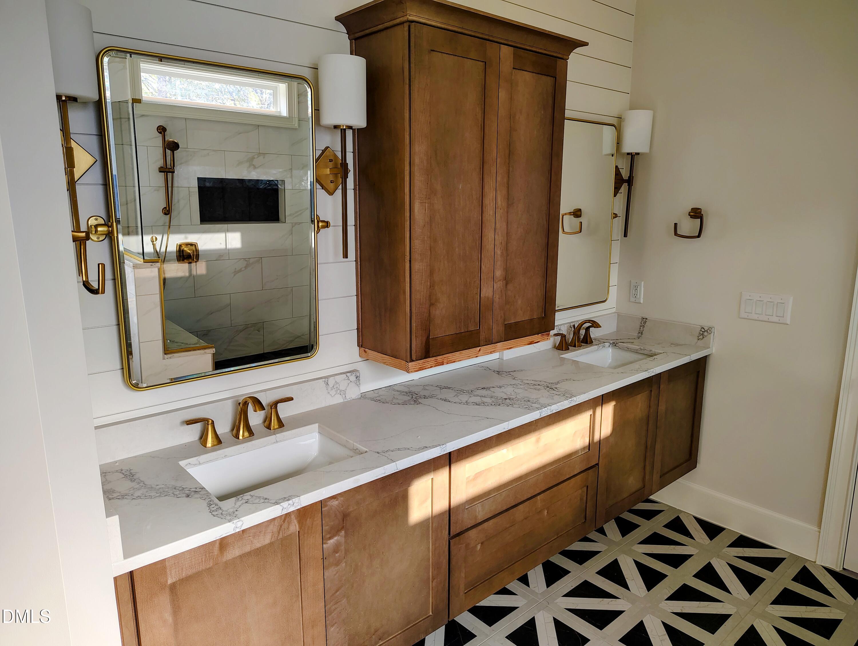 4009 Yates Mill Pond Road Raleigh, NC 27606 - Photo 34 of 52 a bathroom with a sink and a mirror
