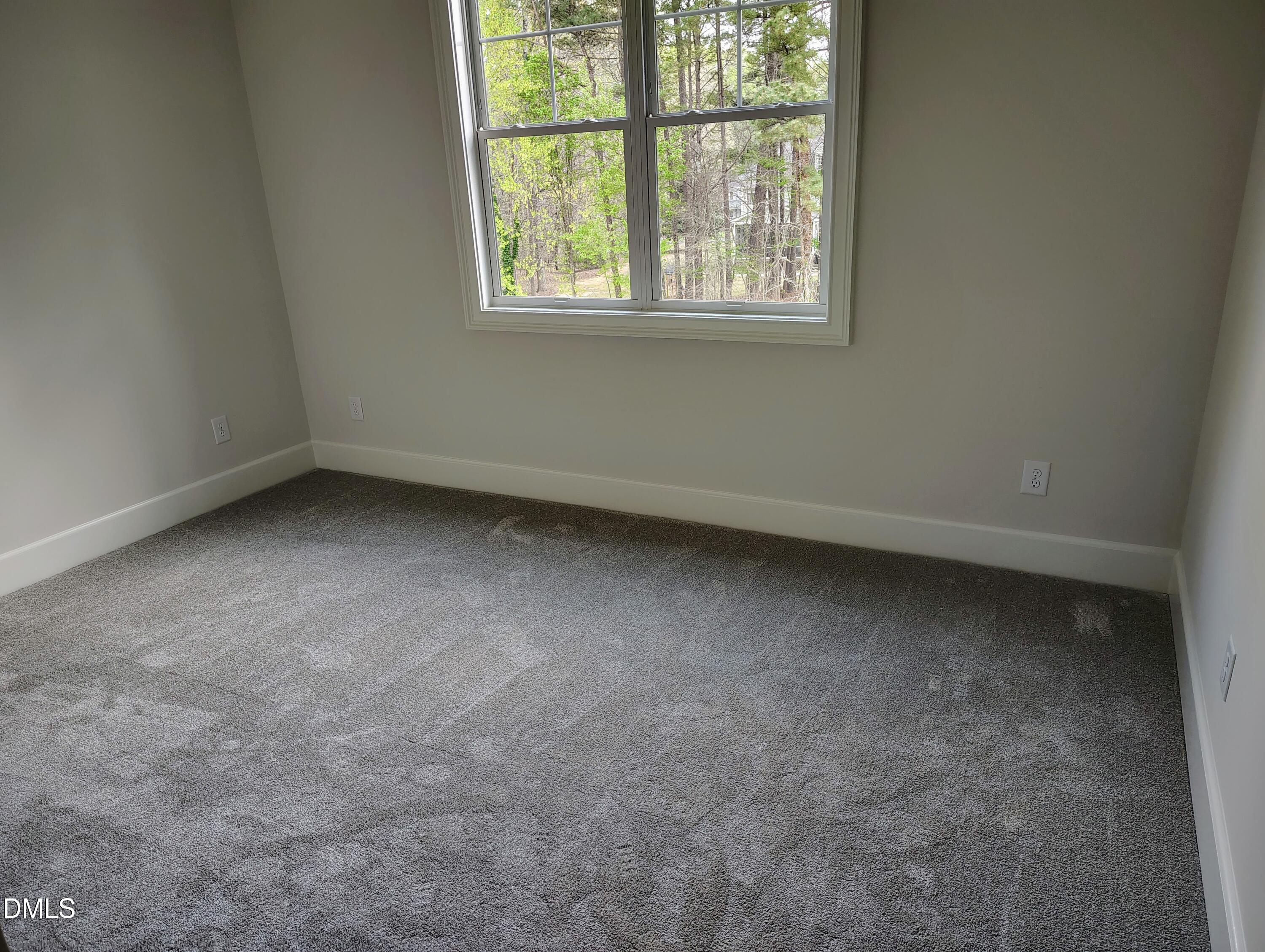 4009 Yates Mill Pond Road Raleigh, NC 27606 - Photo 44 of 52 an empty room with a window