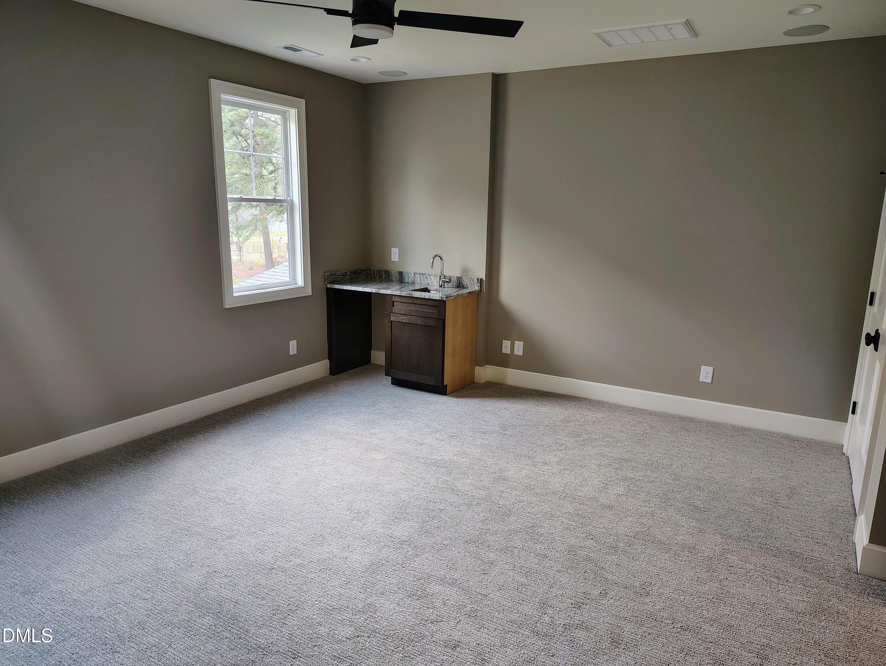 4009 Yates Mill Pond Road Raleigh, NC 27606 - Photo 46 of 52 an empty room with windows