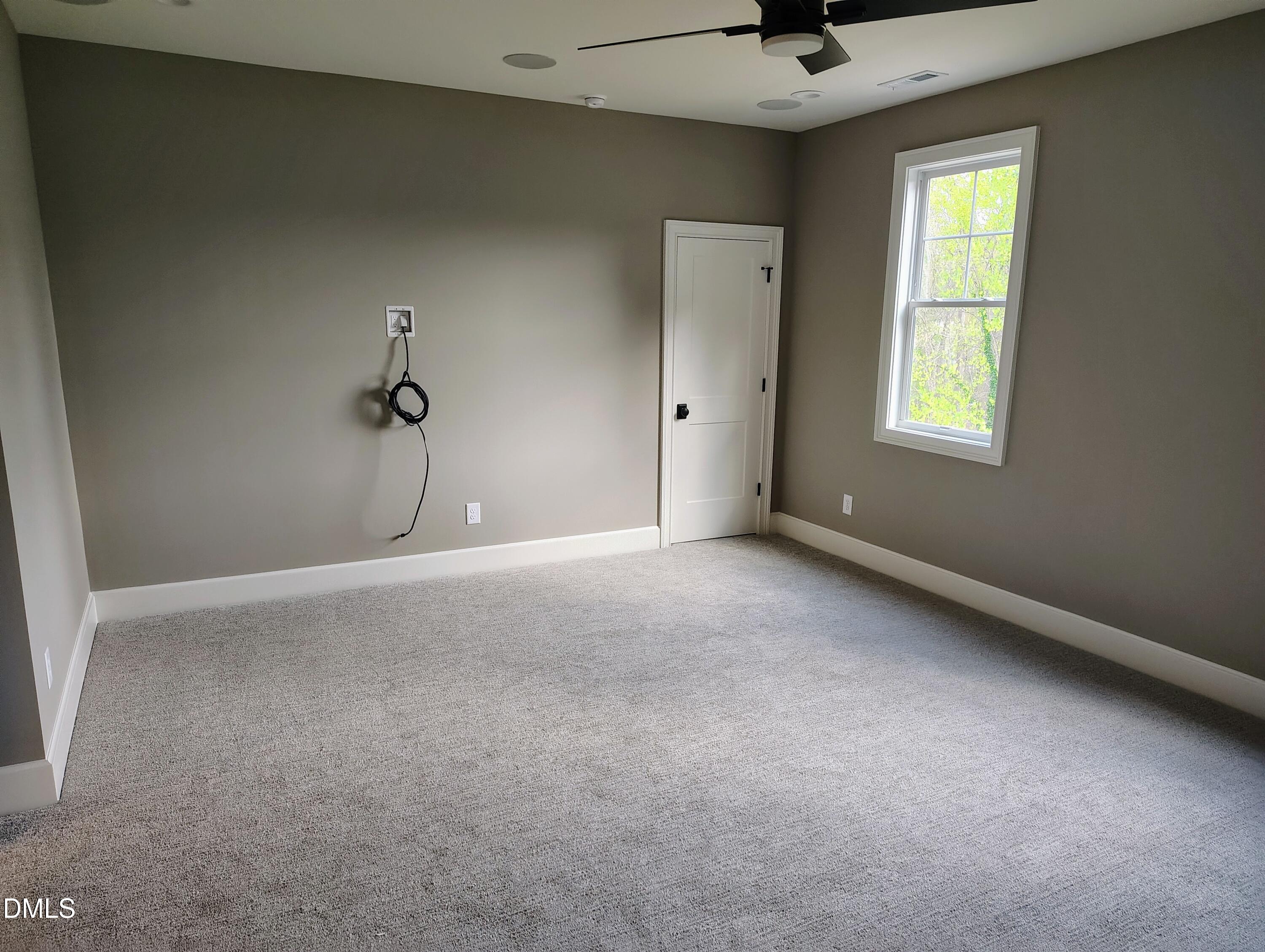 4009 Yates Mill Pond Road Raleigh, NC 27606 - Photo 47 of 52 a view of a livingroom with a ceiling fan and window