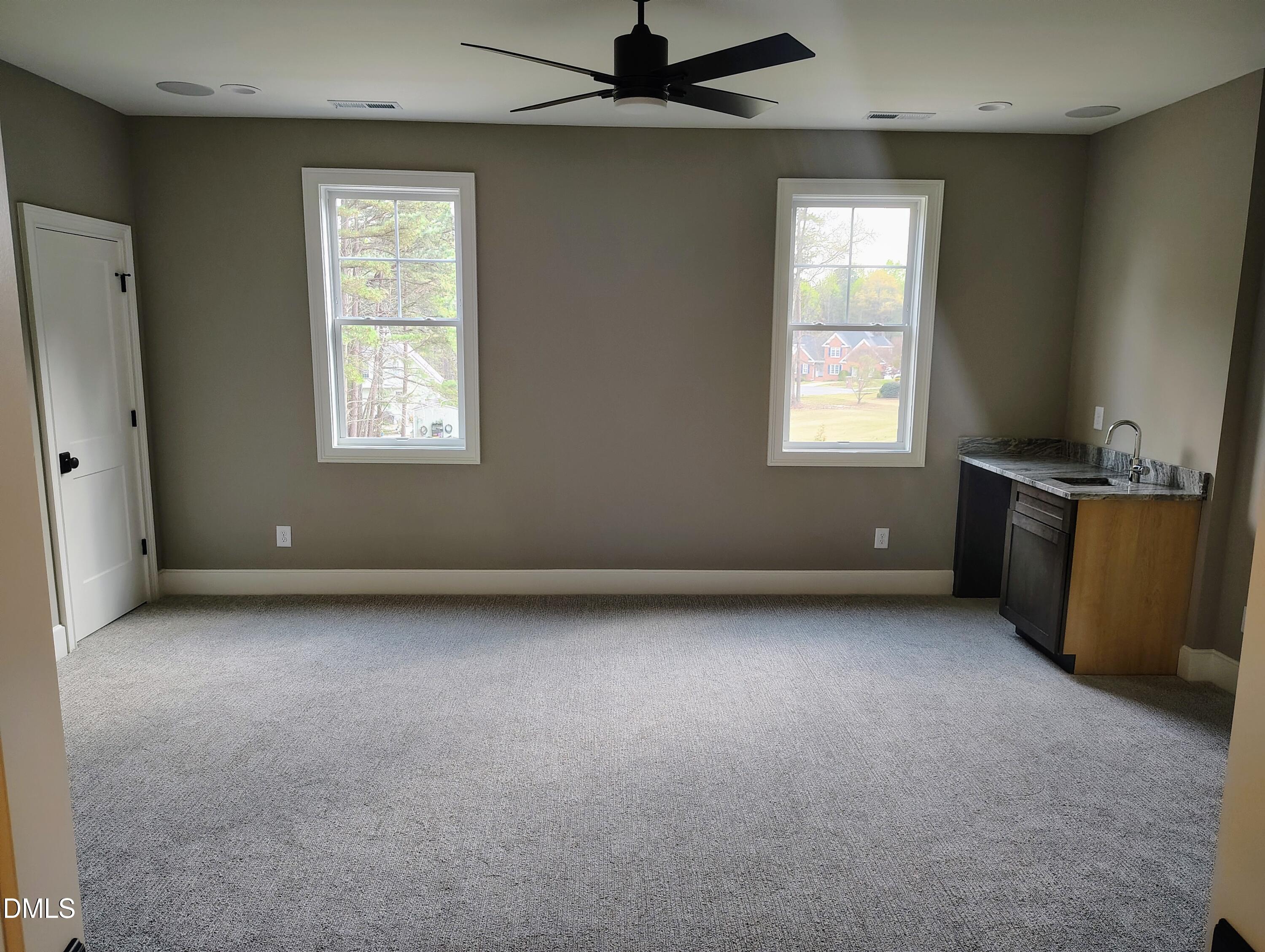 4009 Yates Mill Pond Road Raleigh, NC 27606 - Photo 48 of 52 an empty room with a window