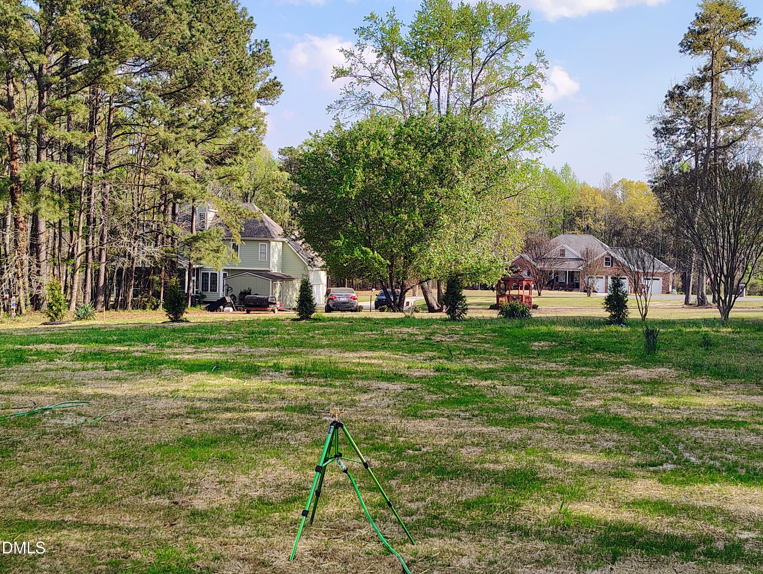 4009 Yates Mill Pond Road Raleigh, NC 27606 - Photo 10 of 52 a view of house with garden