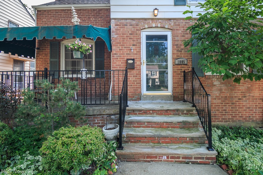 1005 Argonne Road Cleveland, OH 44121 - Photo 2 of 31 Enjoy relaxing on this quaint front porch.