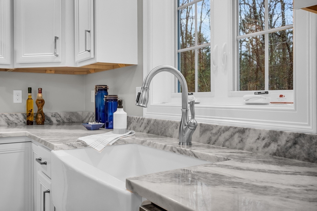 0 Gardner Road, Unit APPLEWOOD Templeton, MA 01468 - Photo 15 of 36 a kitchen with a sink and cabinets