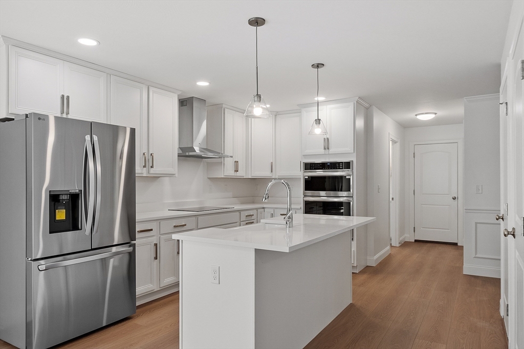 0 Gardner Road, Unit APPLEWOOD Templeton, MA 01468 - Photo 23 of 36 a kitchen with stainless steel appliances a refrigerator sink and microwave